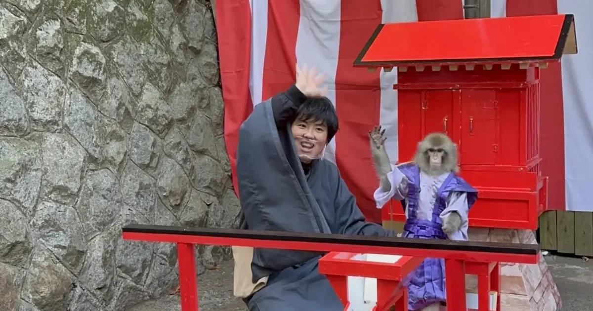 Catherine with her handler at the monkey shrine